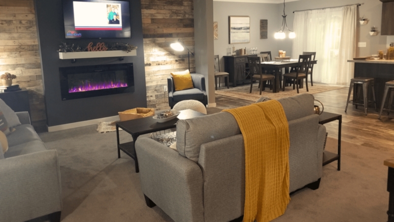 Rustic Wood Plank Fireplace Wall with Vibrant Yellow Accents