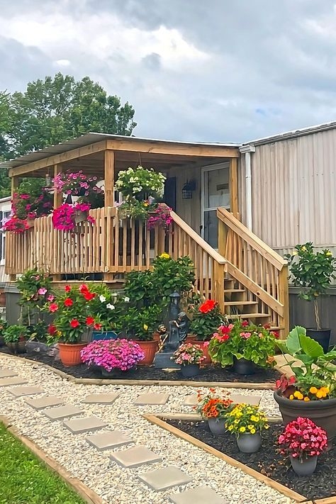 Rustic Wooden Porch with Tiered Container Garden and Stepping Stones