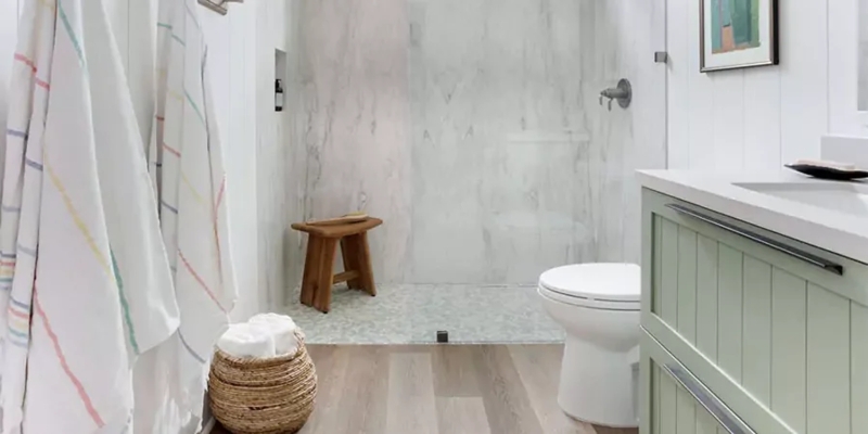 Sage Green Bathroom Vanity Ideas with Pebble Shower Floor Accent