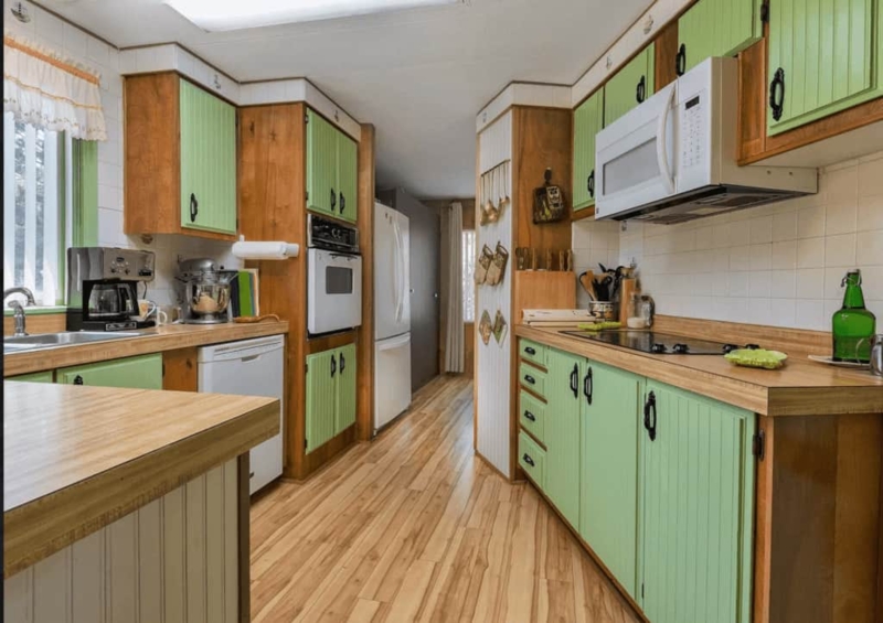 Sage Green Beadboard and Honey Oak Kitchen Cabinets