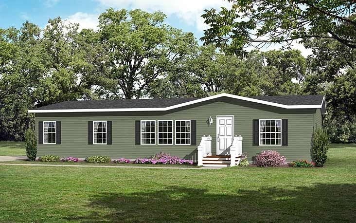 Sage Green Cottage Style Manufactured Home with Charcoal Shutters