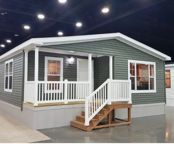 Sage Green Mobile Home with Integrated Front Porch and White Trim