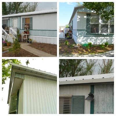 Sage Green Shutters and Gooseneck Light on White Mobile Home Exterior