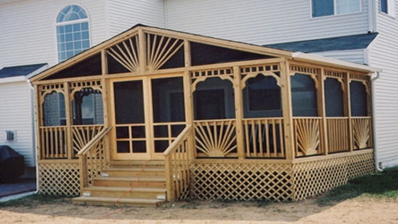 Screened-In Porch Sunburst Panels Lattice Skirting Arched Trim Design