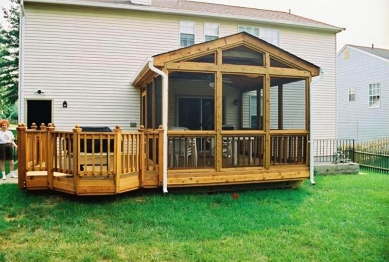 Screened Porch Design with Gabled Roof and Attached Deck