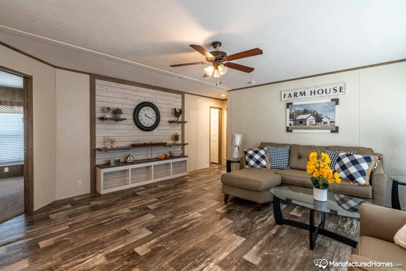 Shiplap Accent Wall with Shelving in Cozy Modern Farmhouse Living Room.