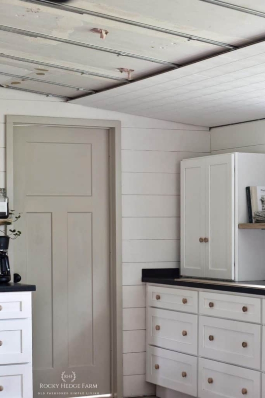 Shiplap Walls: White Modern Farmhouse Kitchen with Wood Plank Ceiling