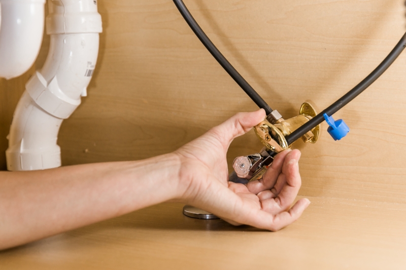 Shut Off Valve: Brass Fixture with Flexible Supply Lines under Sink