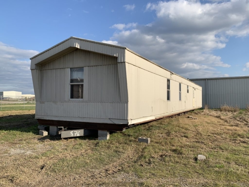 Single Wide Mobile Home Exterior with Vertical Ribbed Siding