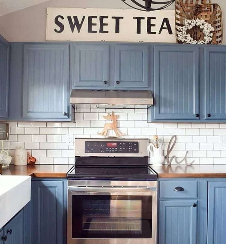 Slate Blue Beadboard Kitchen Cabinets with Wood Countertops