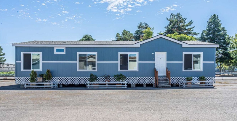 Slate Blue Manufactured Home Exterior with Horizontal White Banding