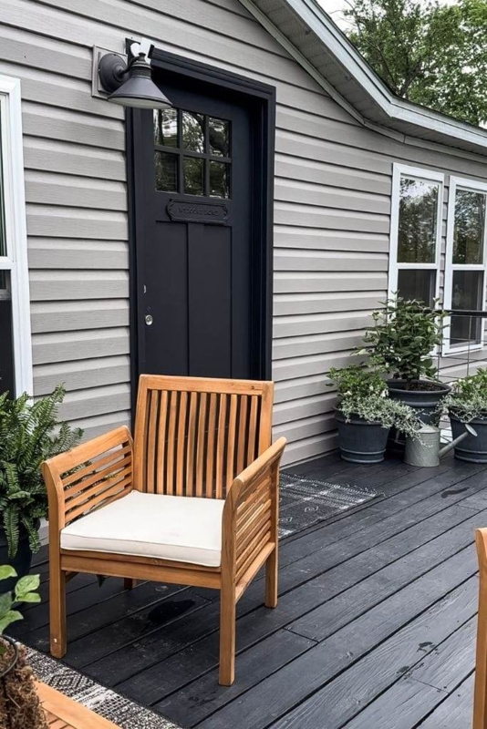 Slatted Wood Patio Armchair on Black Deck with Matte Finish Door