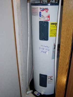 Slim Water Heater in Narrow Alcove with Leak Sensor and Drain Pan
