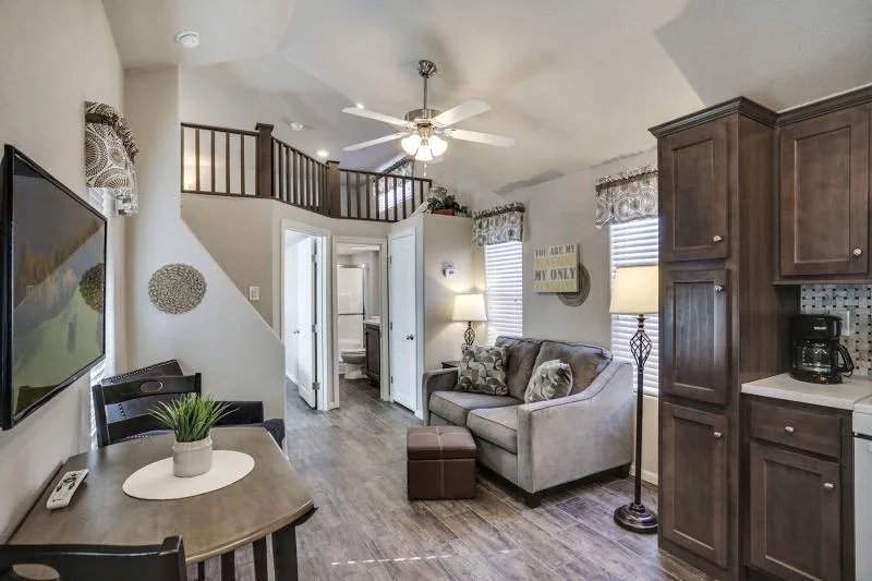 Small Space Open Layout Design featuring Vaulted Ceiling and Loft