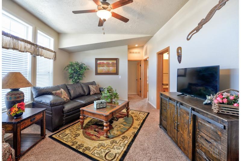 Southwestern Inspired Living Room with Patterned Rug & Barn Doors