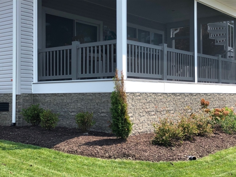 Stone Look Home Skirting beneath Screened Porch Enclosure