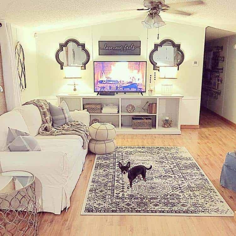 Symmetrical Farmhouse Decor with Quatrefoil Mirrors & Slipcovered Sofa