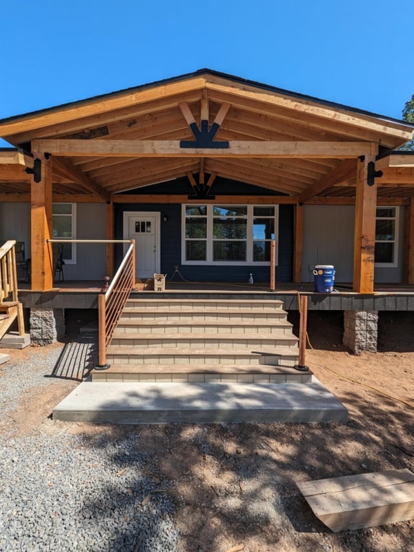 Timber Frame Covered Porch with Cable Railing and Wide Stairs