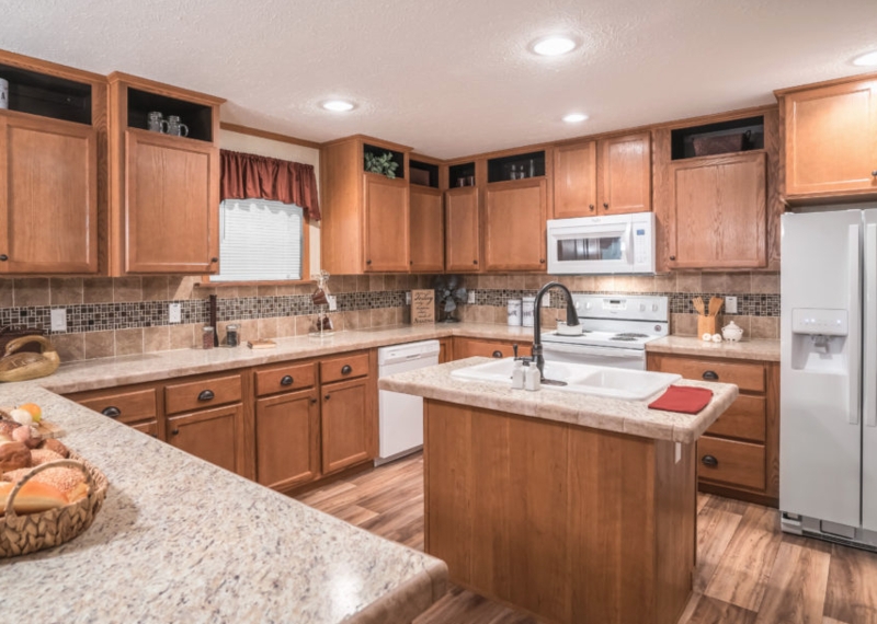 Traditional Kitchen Cabinets with Mosaic Tile Backsplash Accent