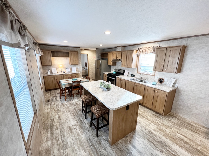 Traditional Kitchen: Coordinated Wood Cabinetry, Stone Look Island