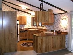 Traditional Kitchen Floral Wallpaper and Vaulted Beam Ceiling