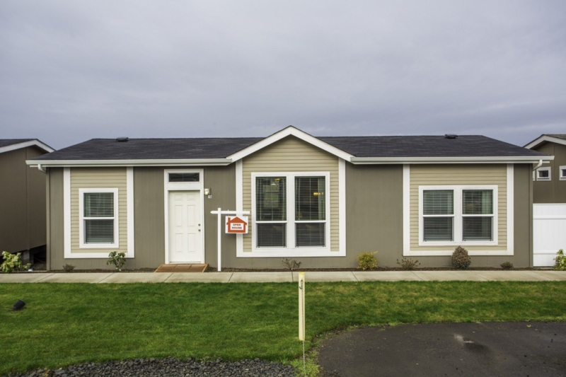 Traditional Manufactured Home Exterior with Taupe Siding and White Trim