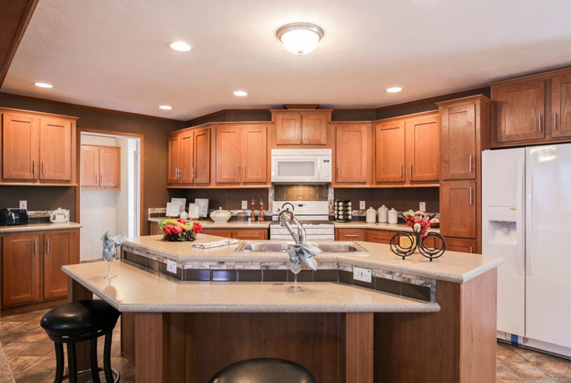 Traditional U-Shaped Kitchen with Tiered Island & White Appliances