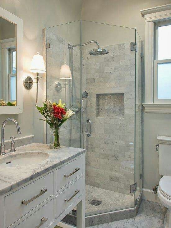 Transitional Bathroom Corner Glass Shower with Stone Subway Tile