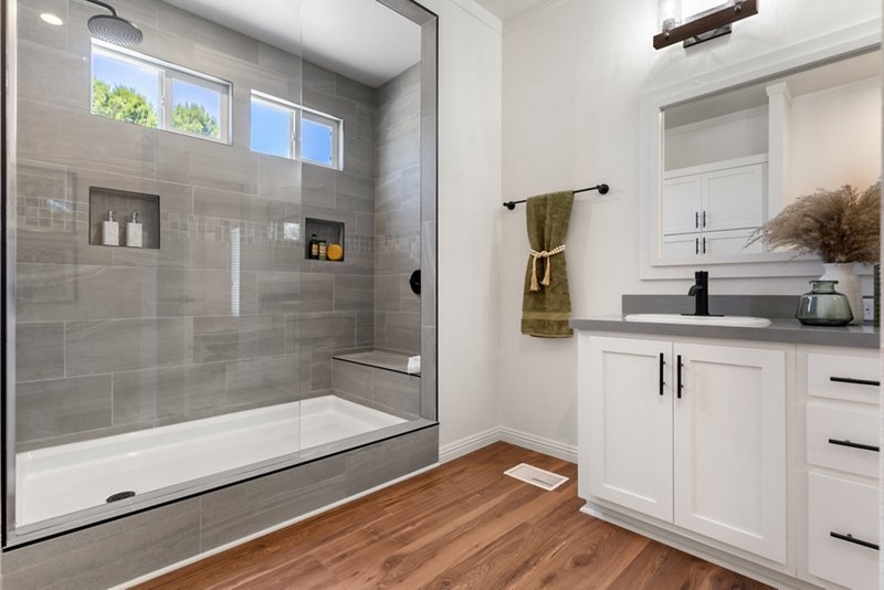 Transitional Bathroom: Walk-In Shower with Built-In Bench and Grey Tile