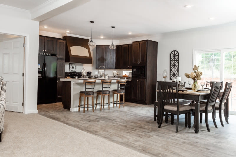 Transitional Kitchen and Dining with Dark Cabinets and Kitchen Island