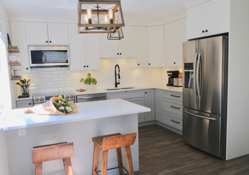 Transitional Kitchen with Two-Tone Cabinetry and Black Industrial Faucet