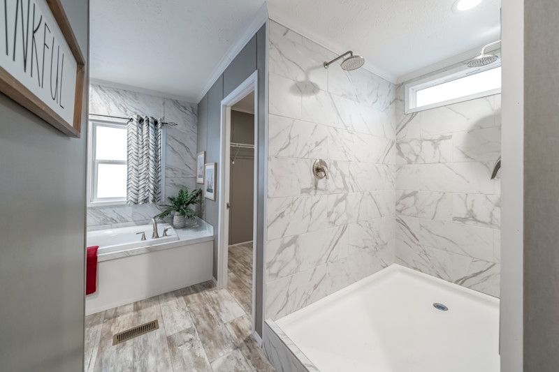 Transitional Master Bath: Marble Tile Surround & Dual Shower Heads
