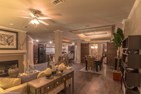 Tray Ceiling Design with Sliding Barn Doors in Dining Area.