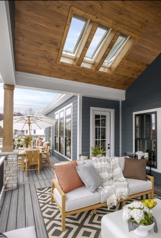 Triple Skylights: Covered Deck, Warm Wood Ceiling, Blue Siding