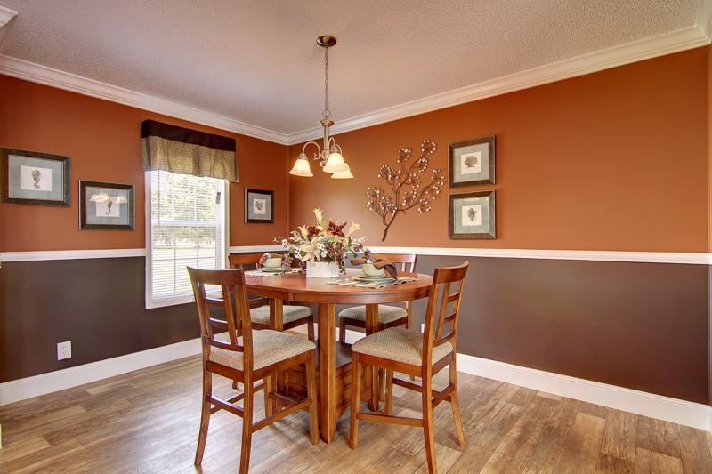 Two-Tone Dining Room Walls: White Chair Rail & Round Wood Table