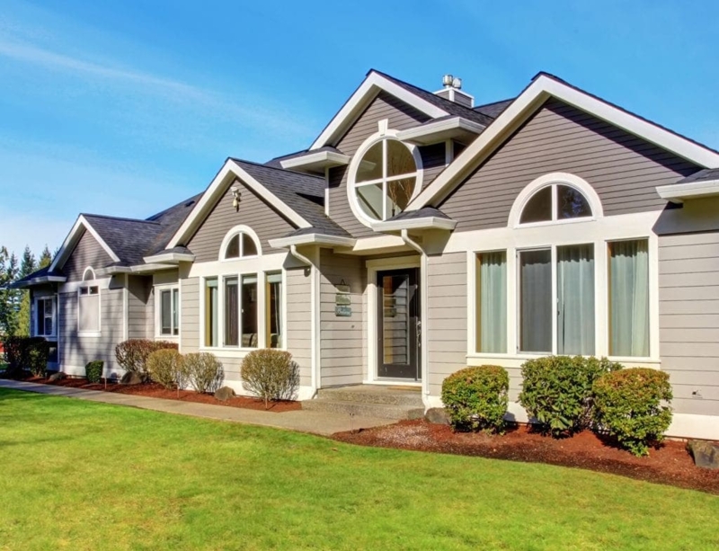 Two-Tone Gray Home Exterior with Architectural Window Mix