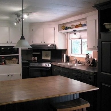 Two-Tone Kitchen Cabinet Ideas: Black and White with Wood Island Top