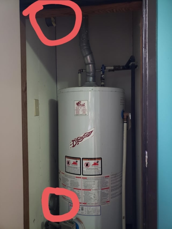 Vertical Water Heater with Top Venting Solution in Compact Closet