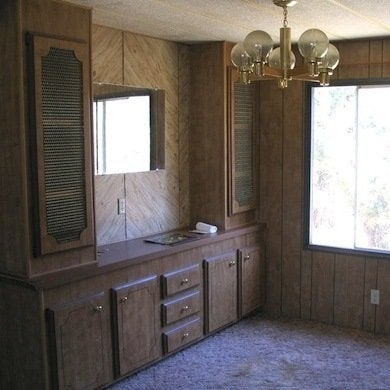 Vintage Wood Paneled Dining Room with Built-In Buffet and Mirror