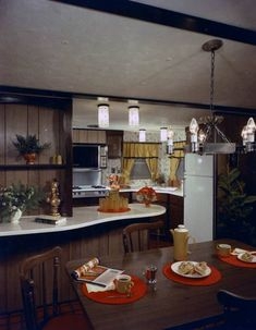 Vintage Wood Paneled Kitchen with Curved Countertop and Ceiling Beams
