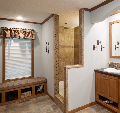Walk In Shower with Curbed Entry and Tile Border Feature.