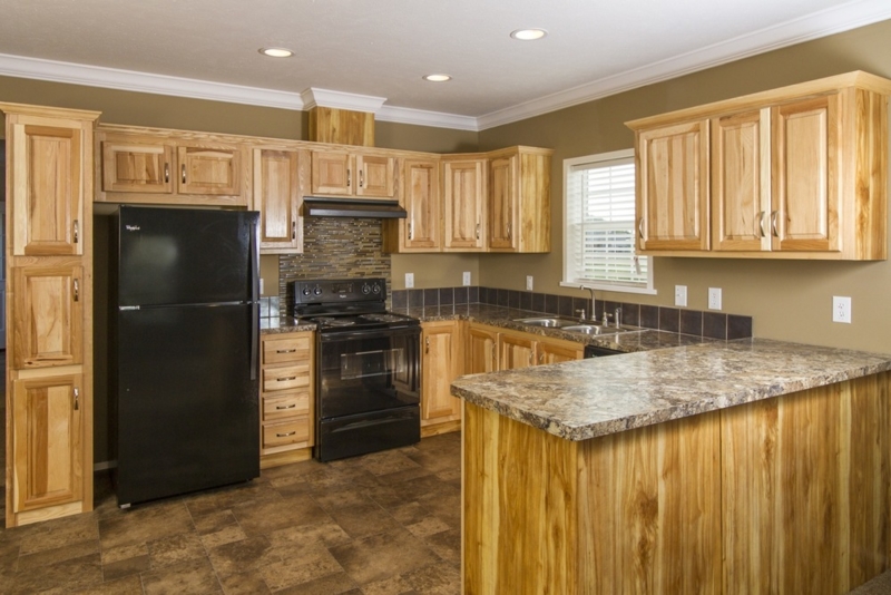 Warm Wood Kitchen Cabinets, Black Appliances, Stone Look Countertops