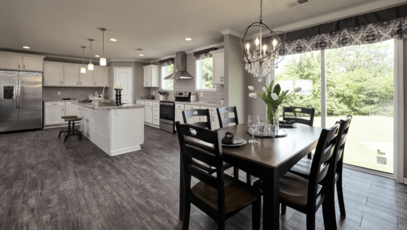 White Shaker Kitchen Cabinets with Crystal Orb Chandelier
