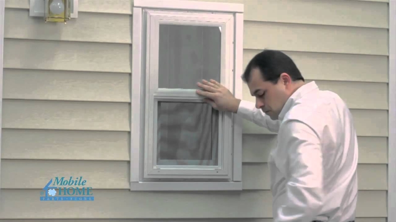 White Vinyl Exterior Window with Lap Siding Integration