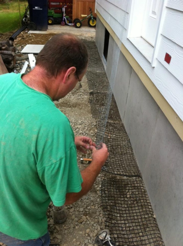 Wire Mesh Foundation Skirting with Concrete Finish and Gravel Base