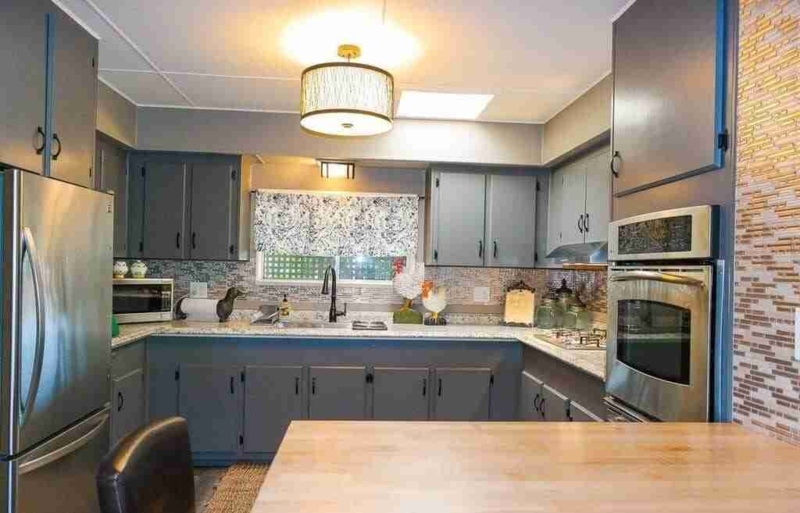Wood Cabinet Kitchen Remodel: U-Shaped Layout and Stainless Steel