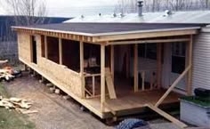 Wood Frame Home Extension Project: Unfinished Full Length Porch