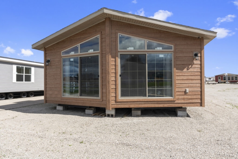 Wood Look Siding Exterior: Manufactured Home with Angled Transom Windows