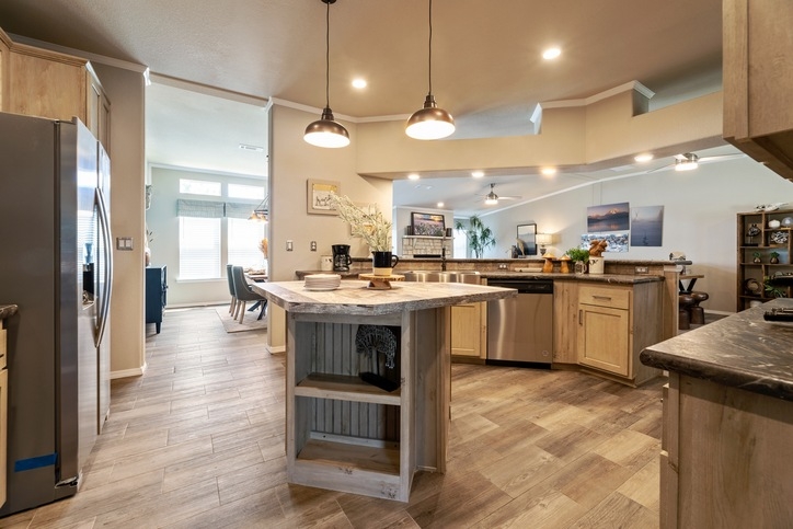 Wood Topped Kitchen Island with Integrated Storage Shelving.