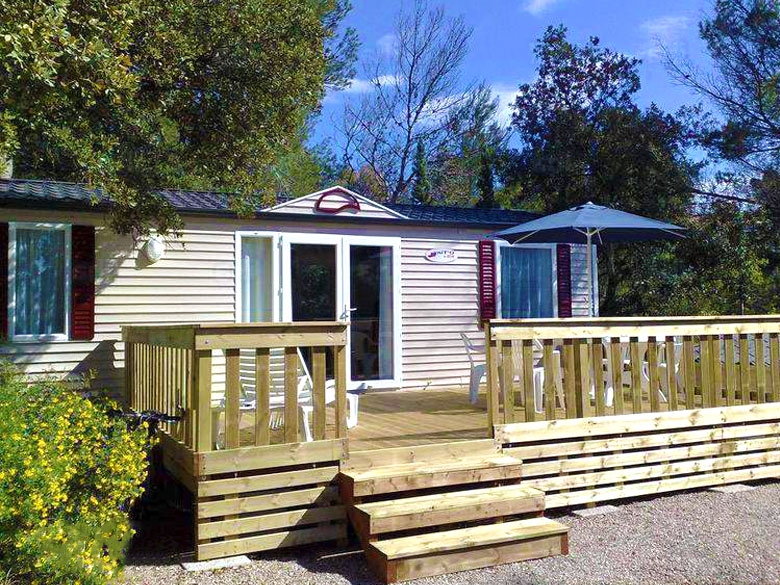Wooden Deck Addition for Mobile Home with Wraparound Railing